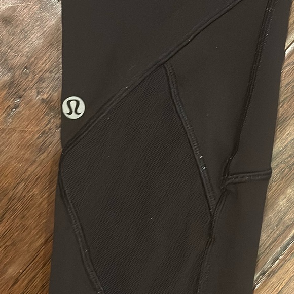 Lululemon Size 6 Black leggings with mesh cut out - Picture 2 of 3